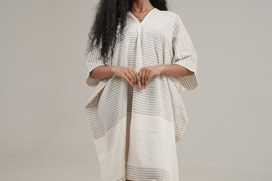 Ari kaftan in grey on ethiopian model and grey background