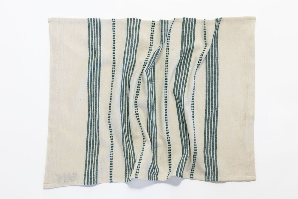 Terrara tea towel in teal unfolded on white background