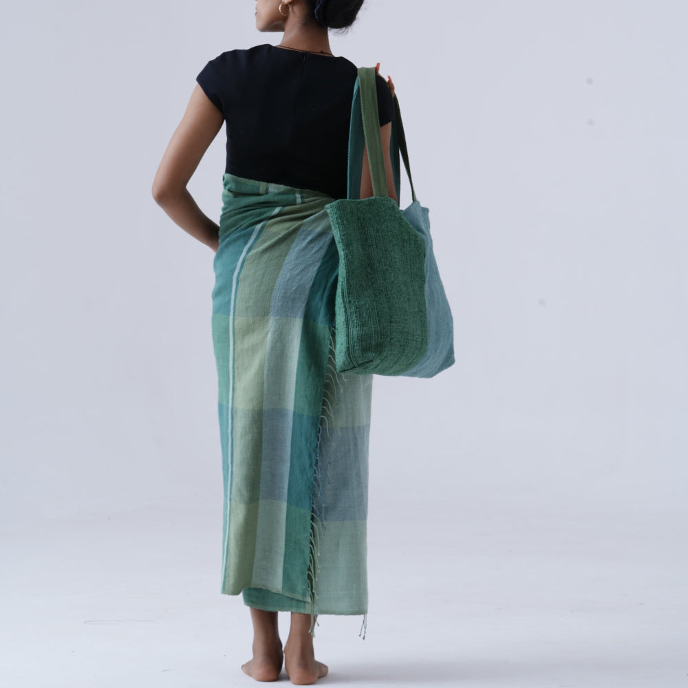 Model wearing Bolsa bag and Mareb towel