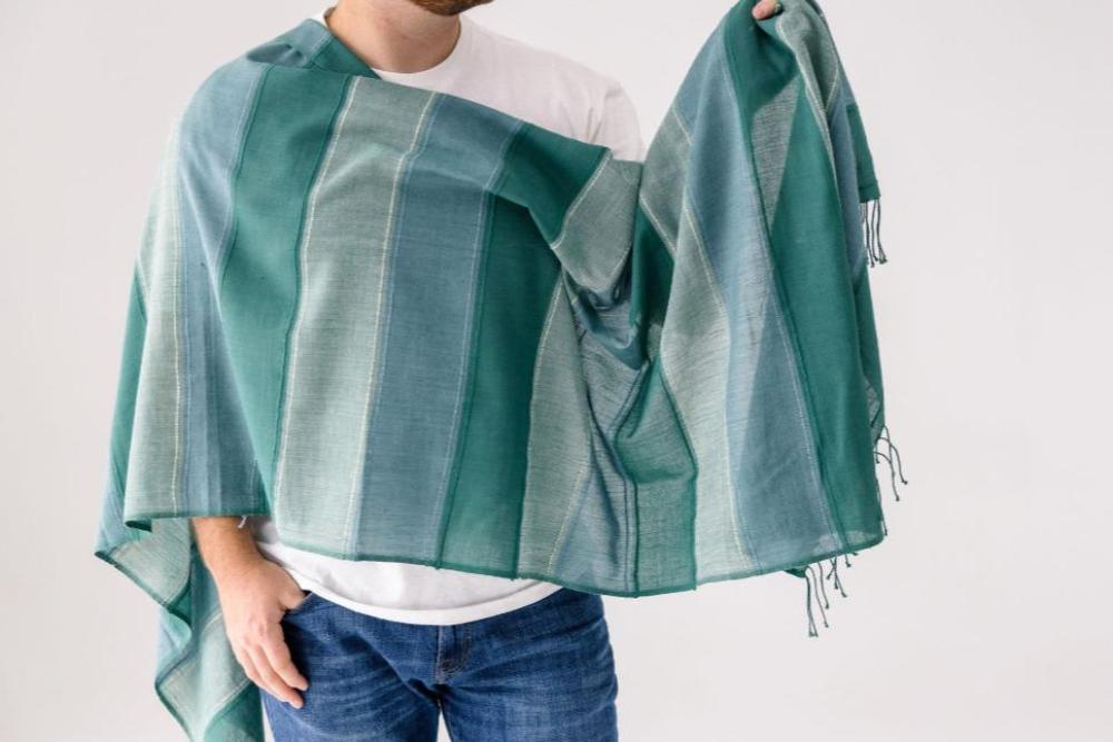 Danakil shawl cedar on male model on white background.