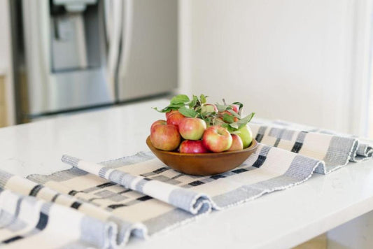 Gonder table runner in black on white table