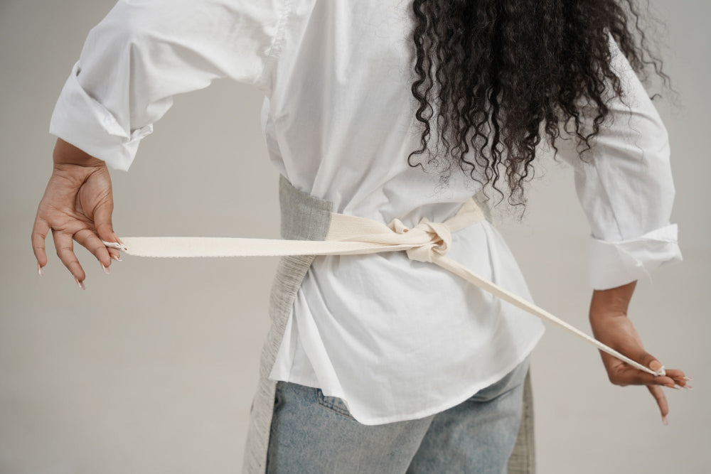 Grey Apron from the back on Model with white background