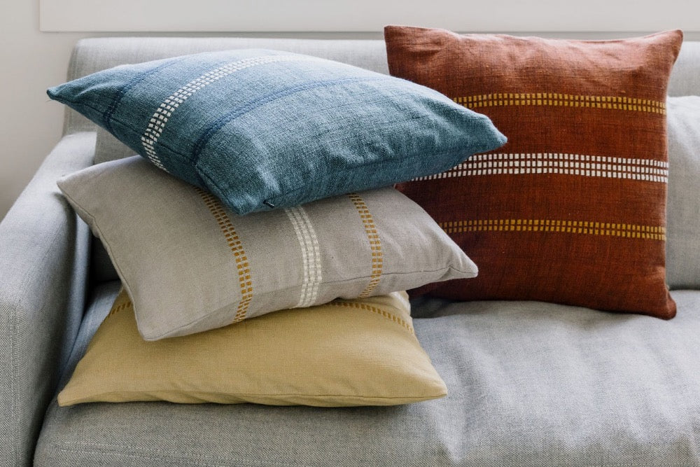 All four Zenach cushion covers on a couch