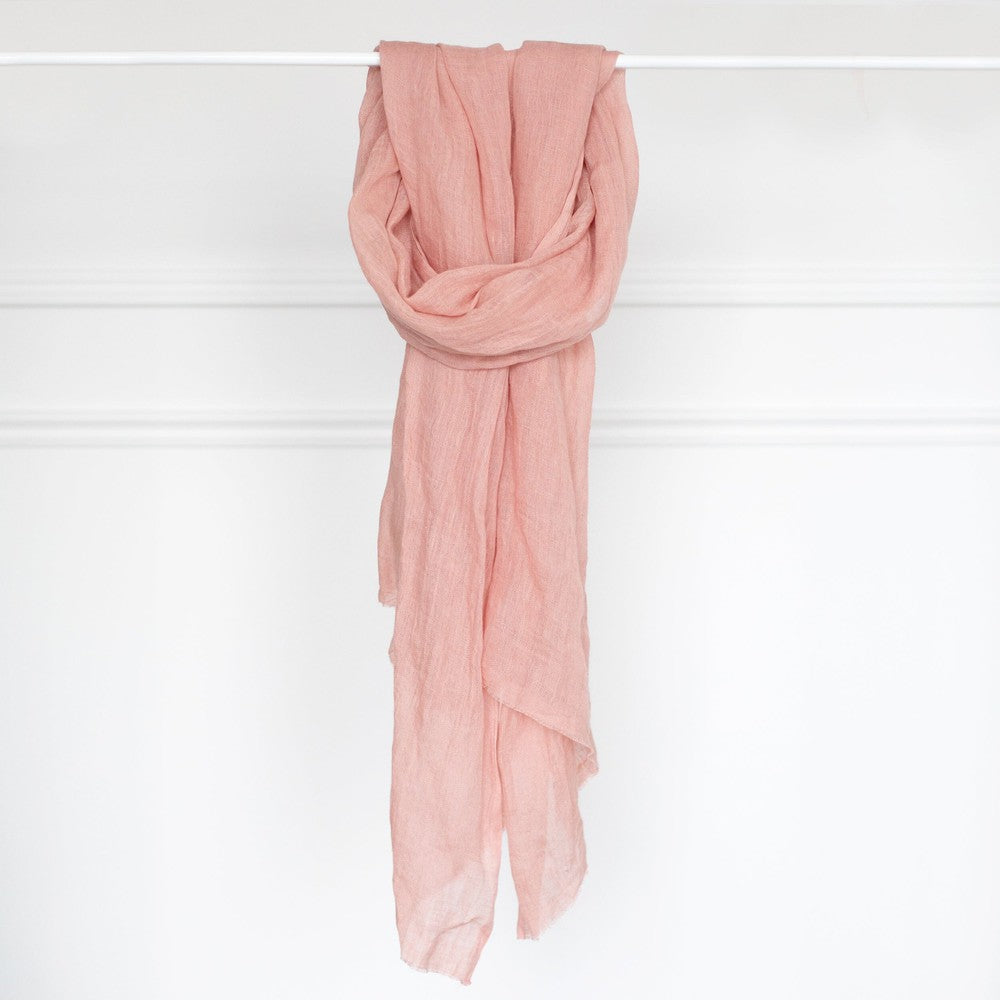 Telba linen shawl in blush on a bar