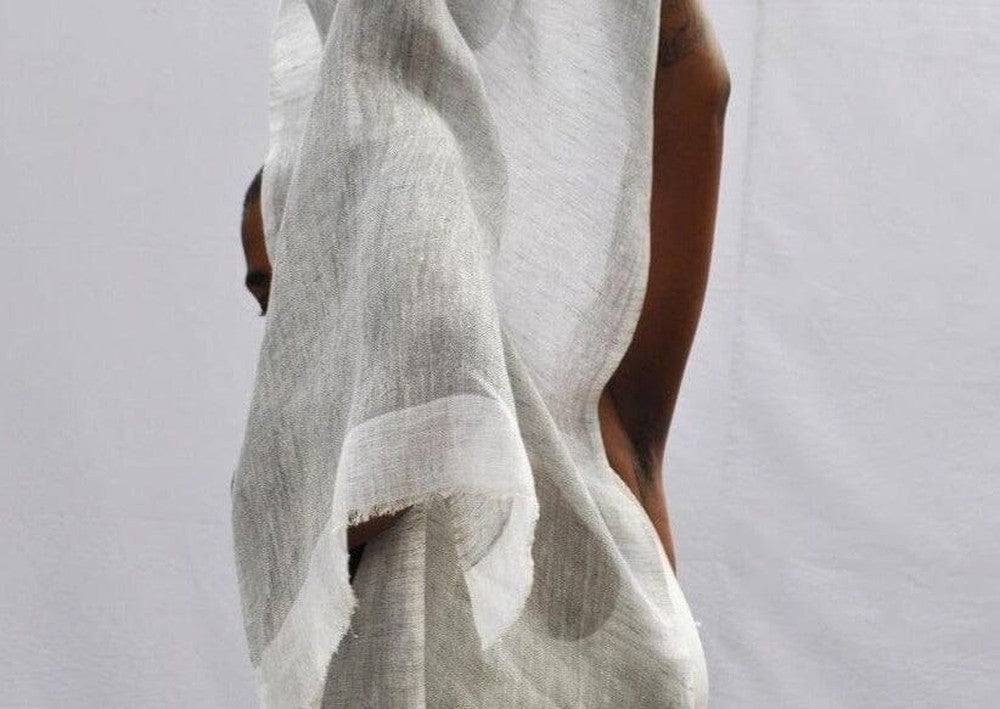 Mariam linen scarf in charchoal aesthetically wrapped around female model