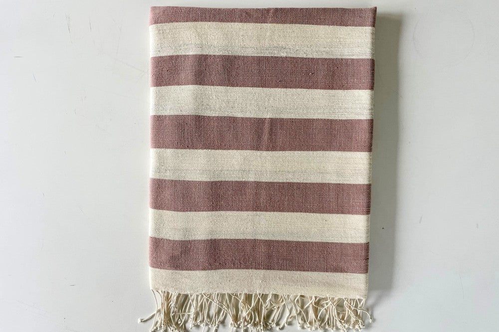 Omo beach towel in Clay flat lay