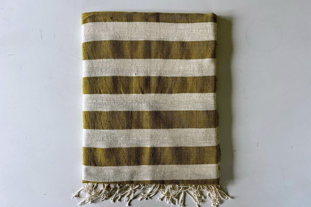 Omo beach towel in Moss flat lay