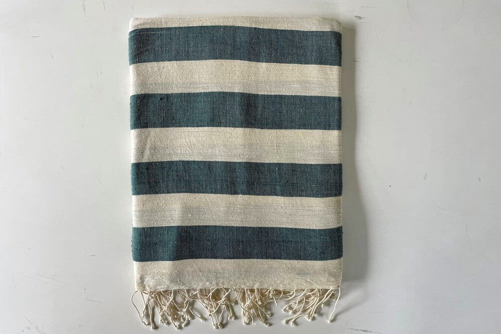 Omo beach towel in Teal flat lay