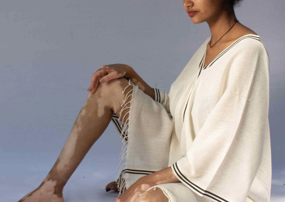 Petra kaftan tunic on female model from the side