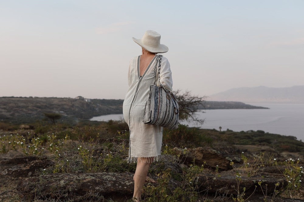 Petra kaftan tunic on female model by the sea