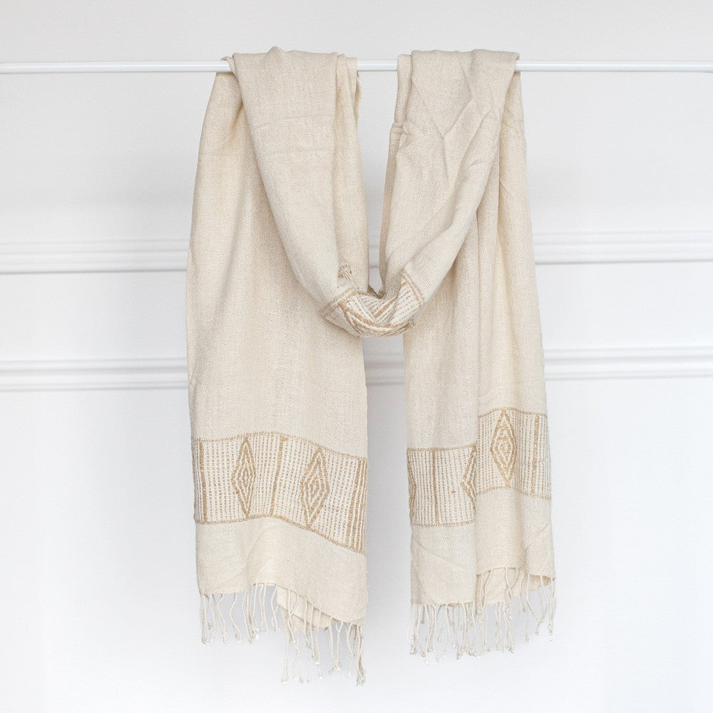 Queen Menon shawl in Ivory and beige on bar with white background