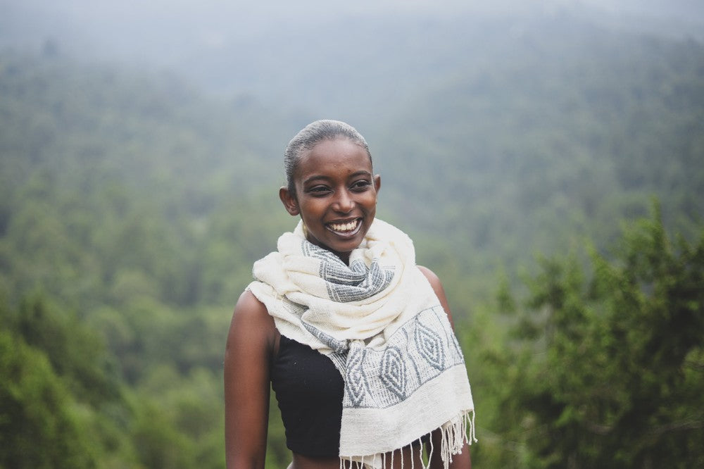 Queen Menon shawl wrapped around female model in nature