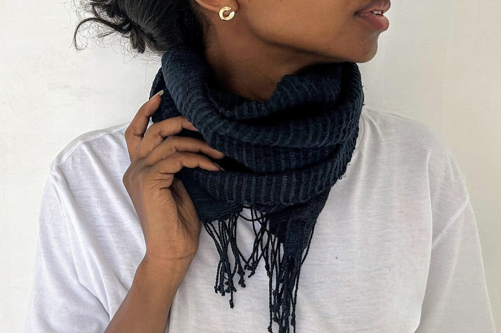 Queen Saba scarf in navy wrapped around female model with white shirt