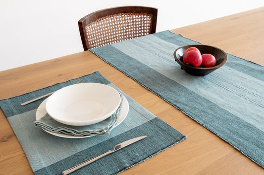 Sodo placemat in flax with sodo table runner on wooden table