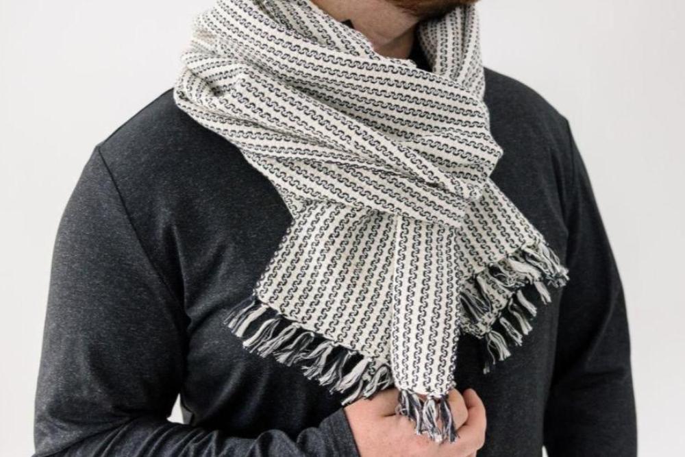 Aaron scarf wrapped around the neck of a male model