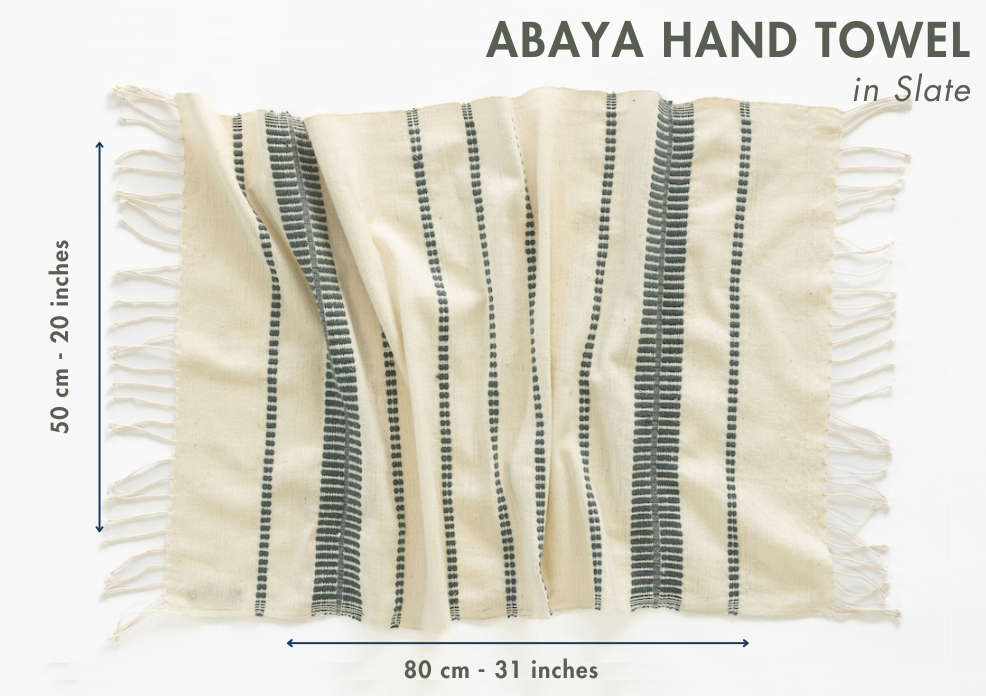 Abaya hand towel with stripes and fringes on a white background