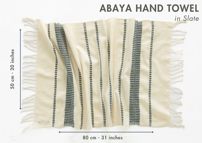 Abaya hand towel with stripes and fringes on a white background