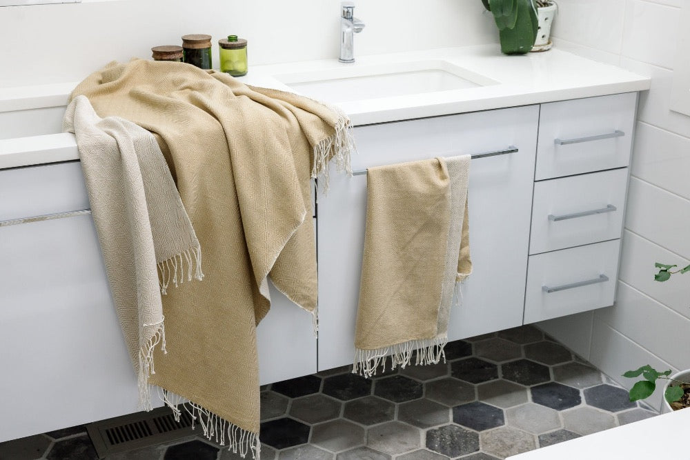 Almaz Bath Towel in Beige in Bathroom