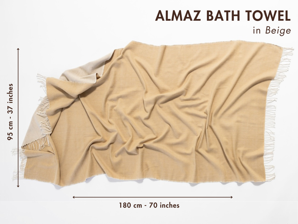 Beige bath towel with dimensions on a white background