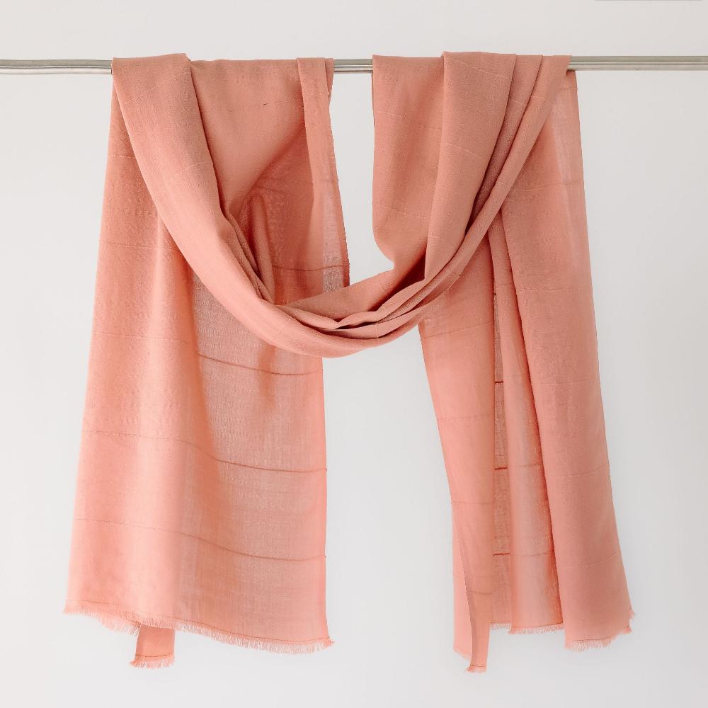 Blush Maraki shawl on a bar