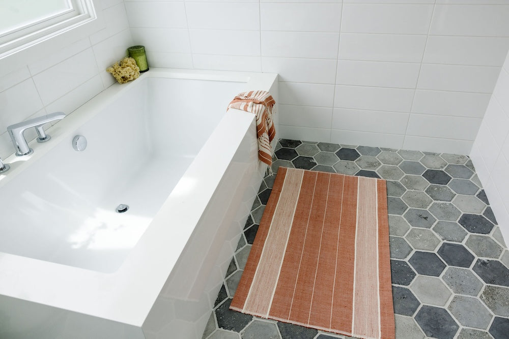 Dawa Bath Mat in Copper in Bathroom 