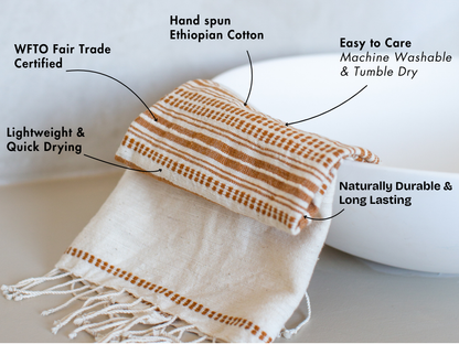 Genale hand towel in ivory bronze with key features
