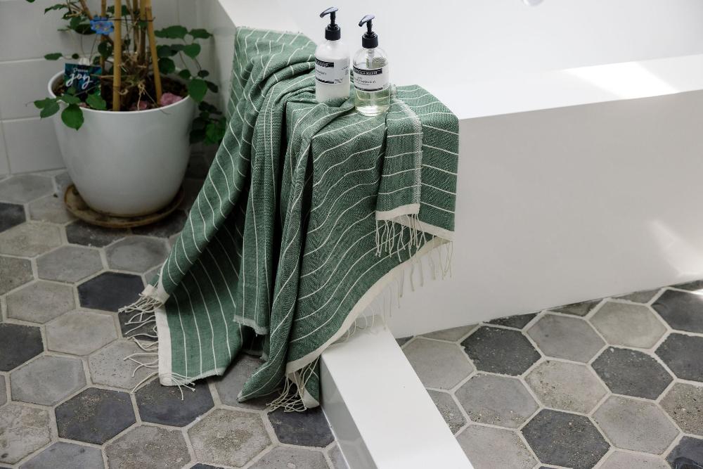 Jamma Bath Towel in Cedar in Bathroom