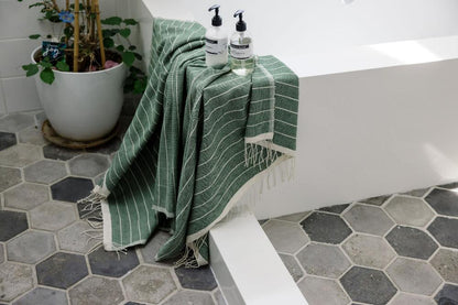 Jamma Bath Towel in Cedar in Bathroom