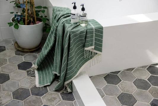 Jamma Bath Towel in Cedar in Bathroom