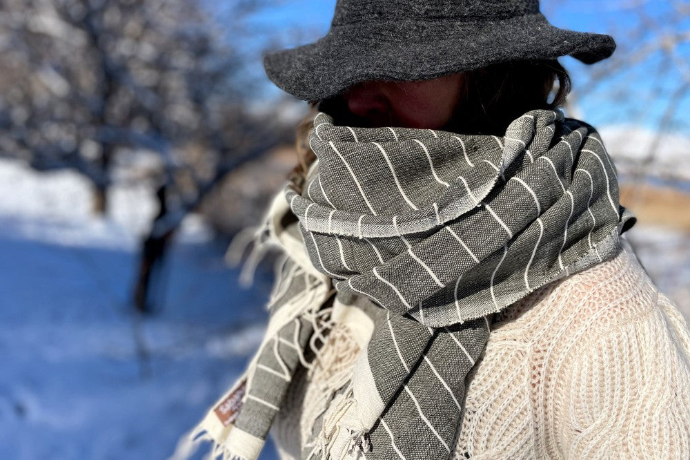 Jamma Bath Towel in Ivory as a Shawl