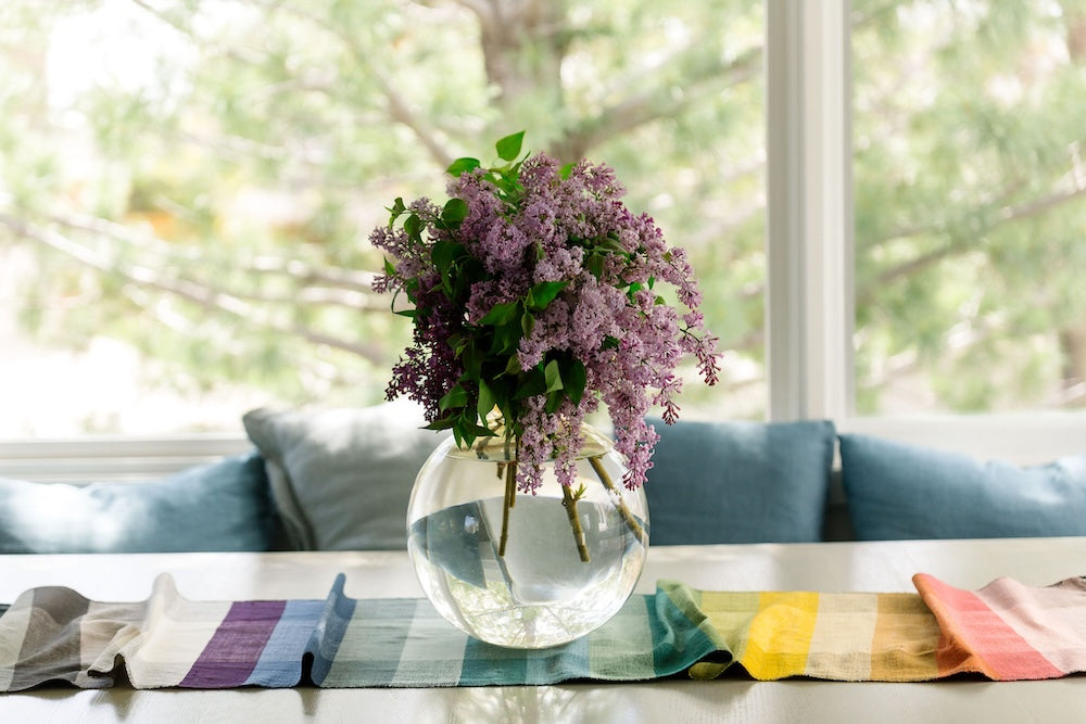 Kalam Table Runner on Table with flowers