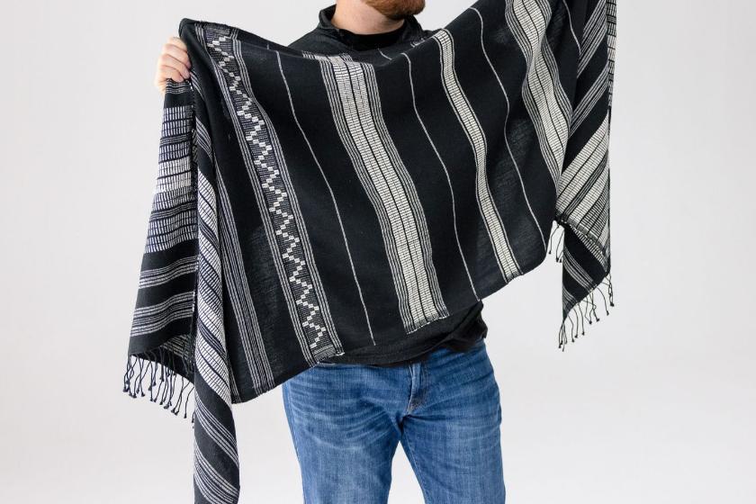 Man holding shawl