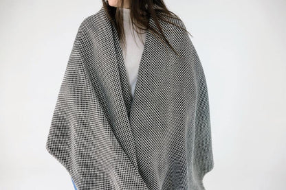 Maya shawl in black and white on female model