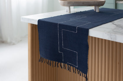 Rift Valley table runner navy on a table