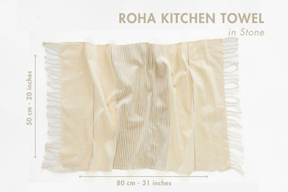 Roha kitchen towel in stone with fringes and dimensions on a white background