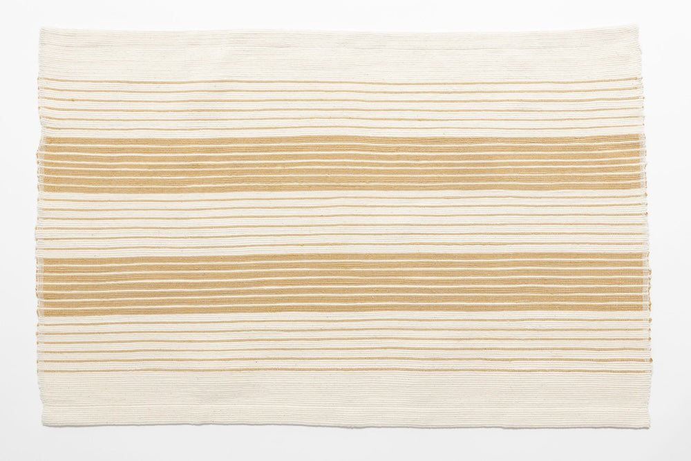 Teka bath mat in beige flat lay on white background