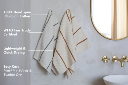 Wari hand towels in grey and bronze with key features