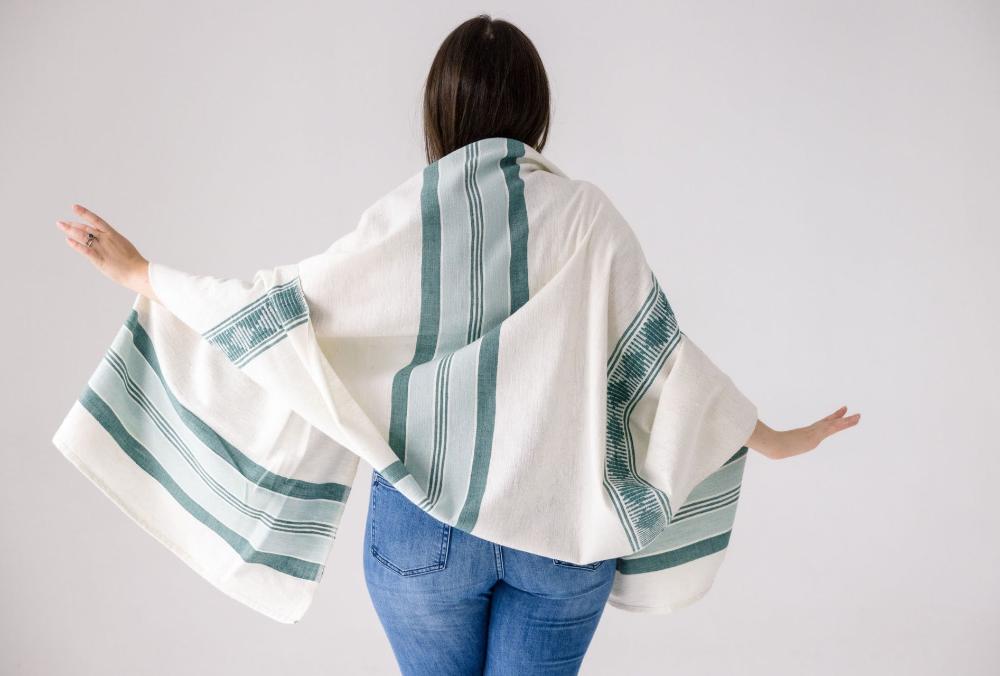 Weyra towel in azurro and teal on model from behind
