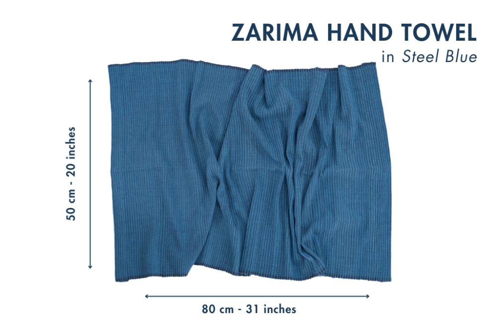 Zarima hand towel in Steel Blue with dimensions on a white background