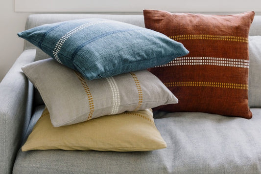 All four Zenach cushion covers on a couch