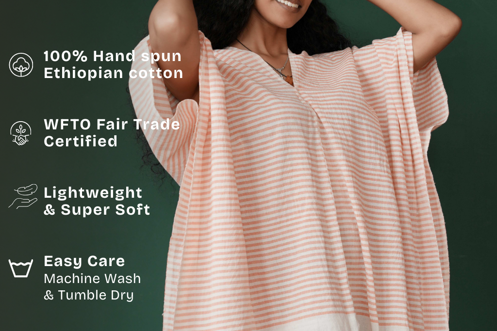 ari kaftan in salmon with key features with green background