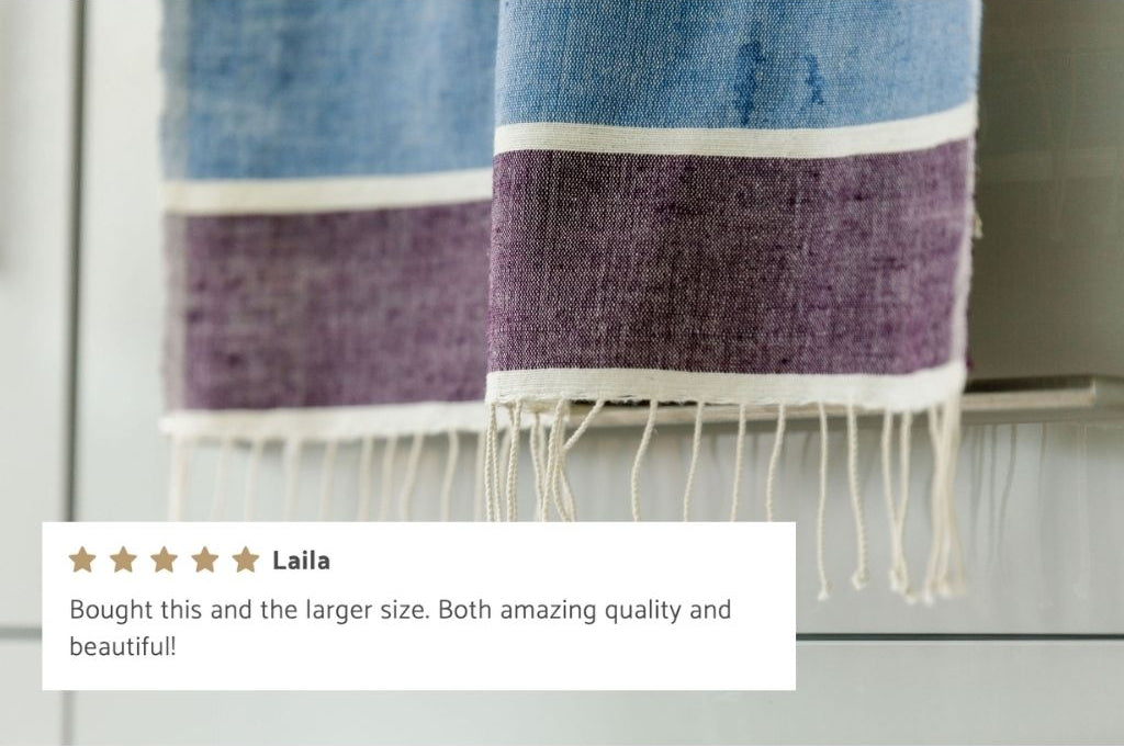 kalam hand towel hanging with five customer review