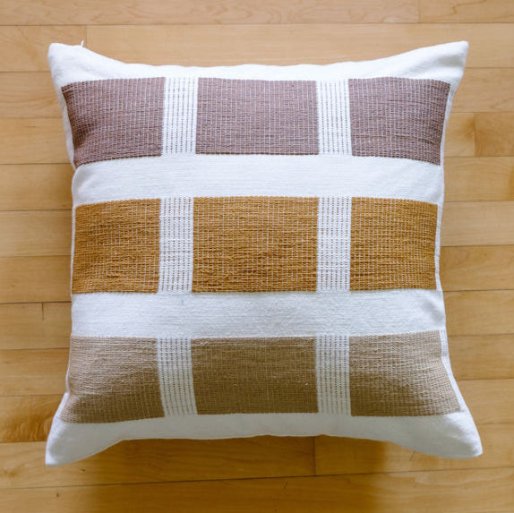 kare pillow in bronze flat lay