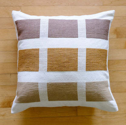 kare pillow in bronze flat lay