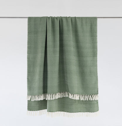 Mechot throw blanket in mint on bar with white background