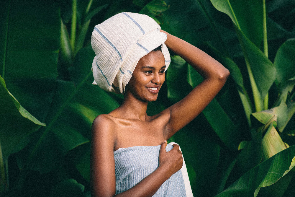 model in nature with wari towel wrapped around her head