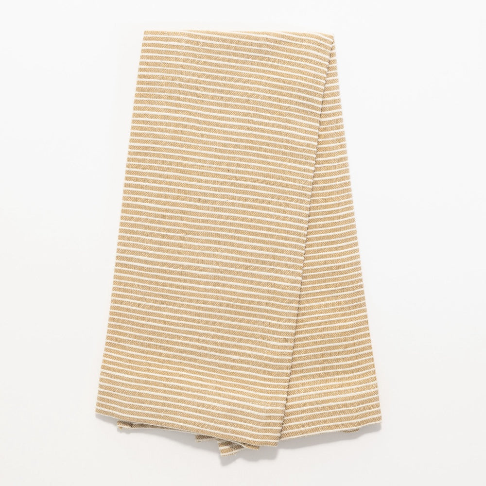 Turkana tea towel in bronze folded on white background