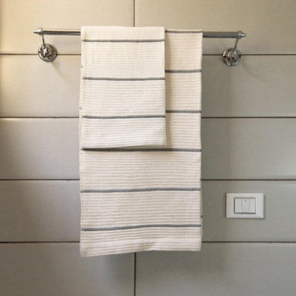 Wari hand towel in grey in bathroom